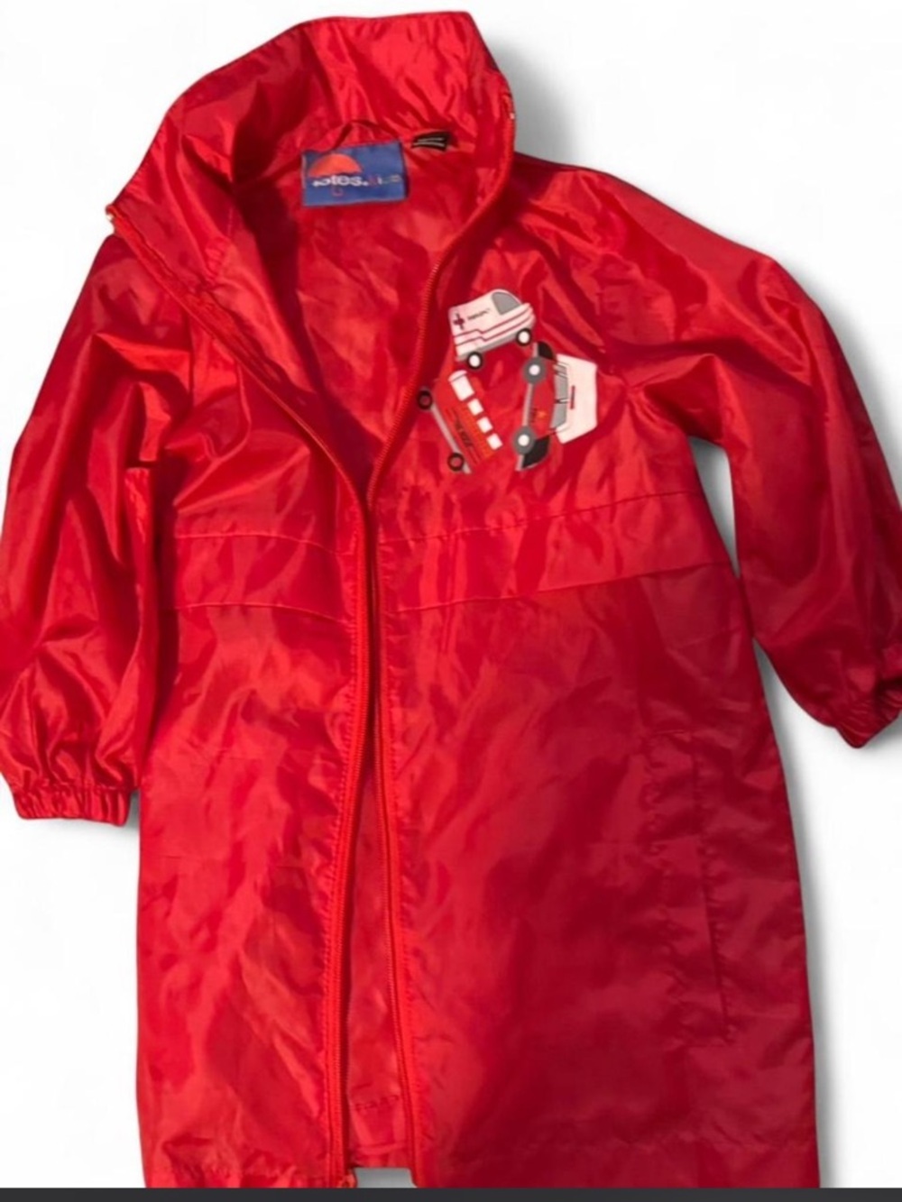 red Totes kids' rain jacket featuring various emergency vehicles
